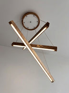 Linear two-bar wood LED pendant light over kitchen island — photo 11