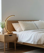 Arc wood LED table lamp with touch dimmer on bedside table — photo 3