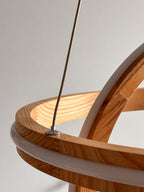 Two ring oak wood LED pendant light over kitchen island — photo 8