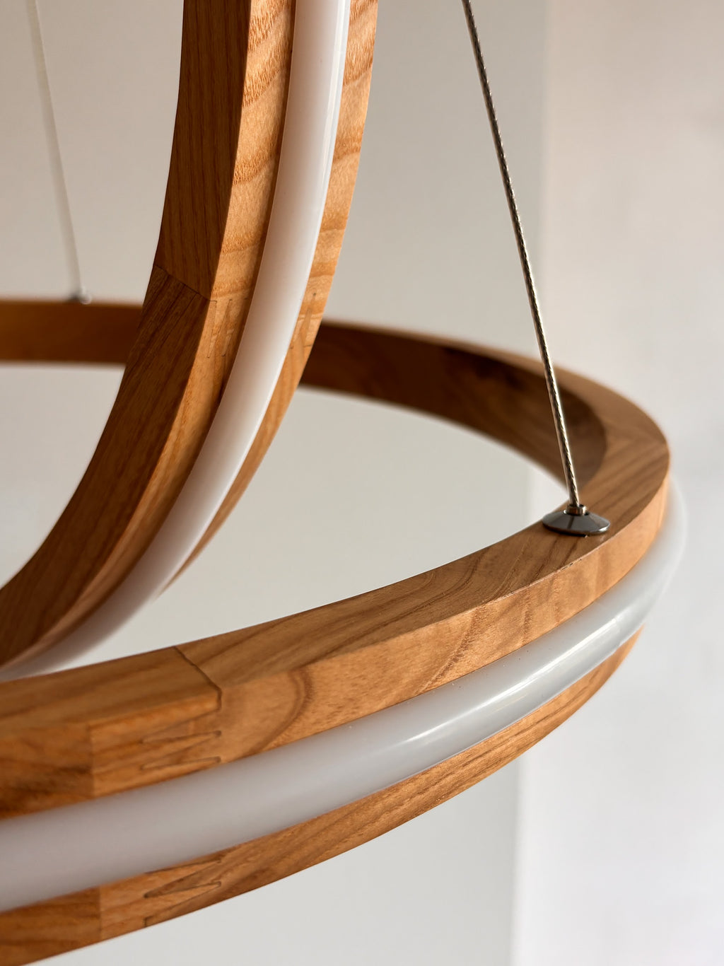 Two ring oak wood LED pendant light over kitchen island — photo 5