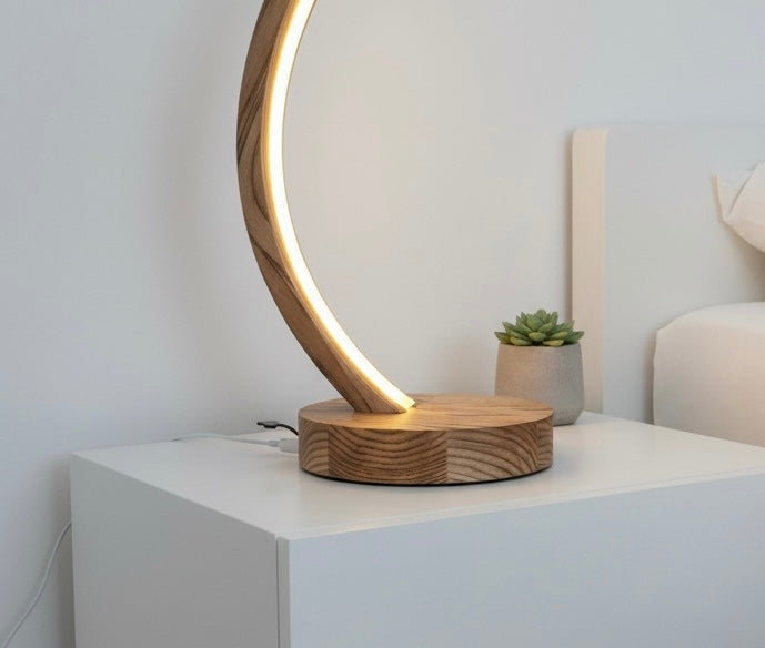 Arc wood LED table lamp with touch dimmer on bedside table — photo 7