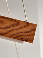 Linear two-bar wood LED pendant light over kitchen island — photo 9