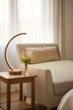 Arc wood LED table lamp with touch dimmer on bedside table — photo 5