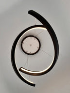 Black wood ring LED pendant light over dining table — photo 10
