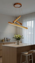 Linear two-bar wood LED pendant light over kitchen island — photo 4