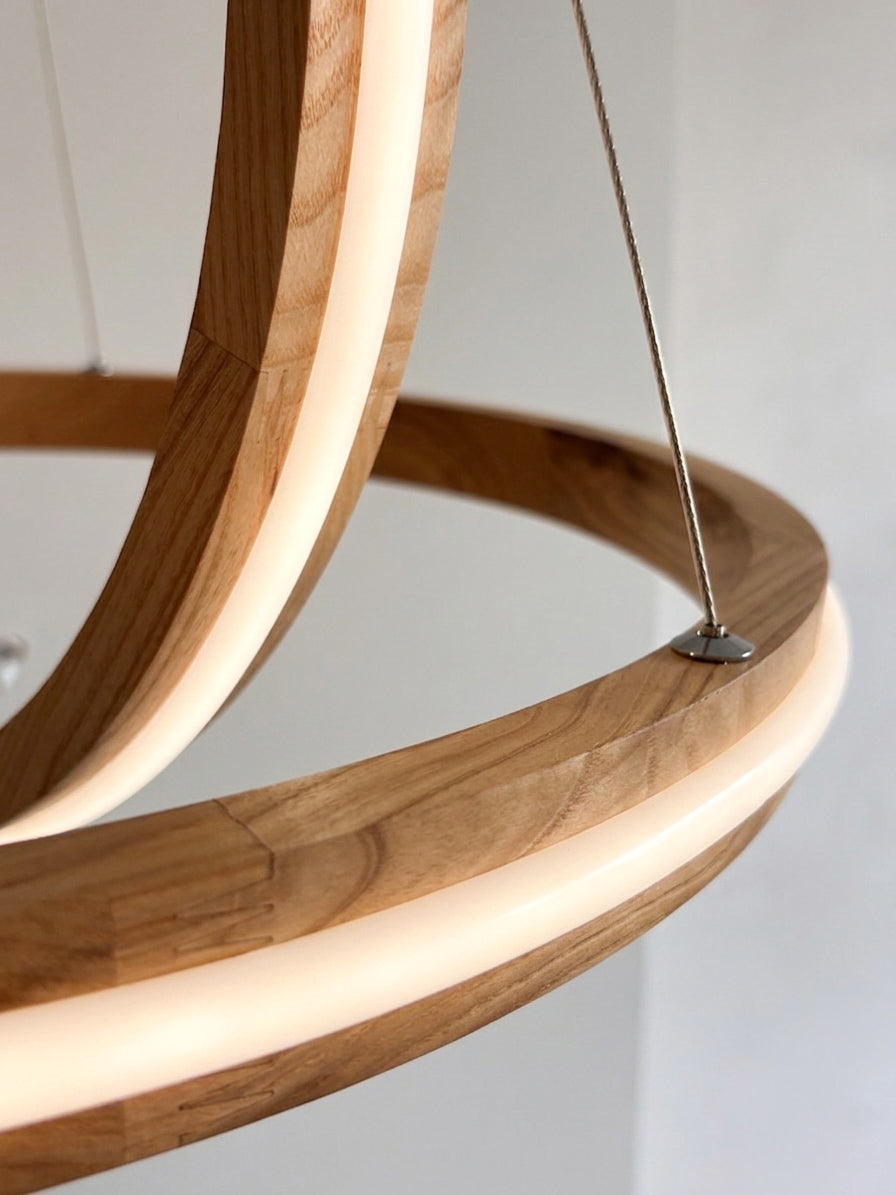 Two ring oak wood LED pendant light over kitchen island — photo 9