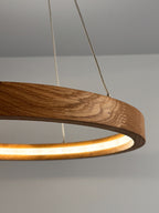 Oak ring LED pendant light with black canopy over kitchen island — photo 7