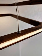 Two-tier rectangular wood LED pendant light over desk — photo 6