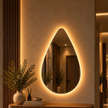 Teardrop backlit LED mirror, frameless, above an entryway console