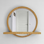 Handmade round wood wall mirror with a built-in shelf