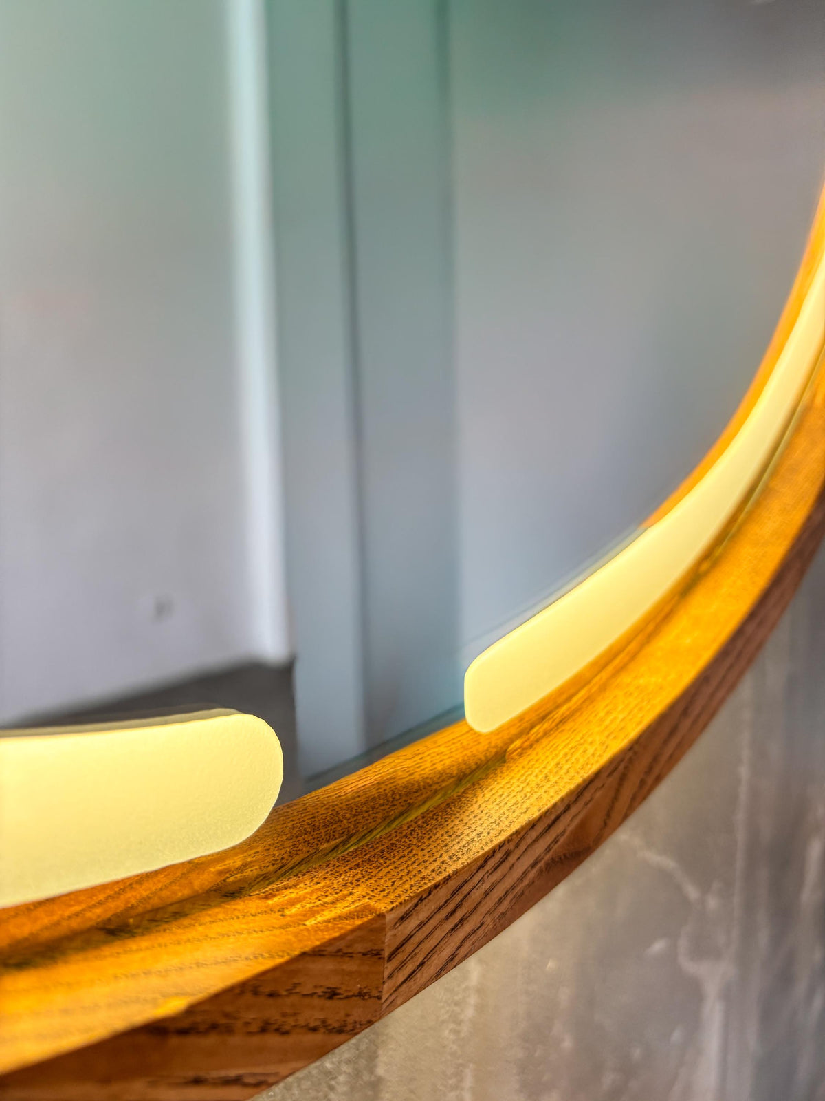 Close-up of the LED glow behind the wooden frame
