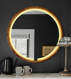 Round LED wood mirror in a dark bathroom interior