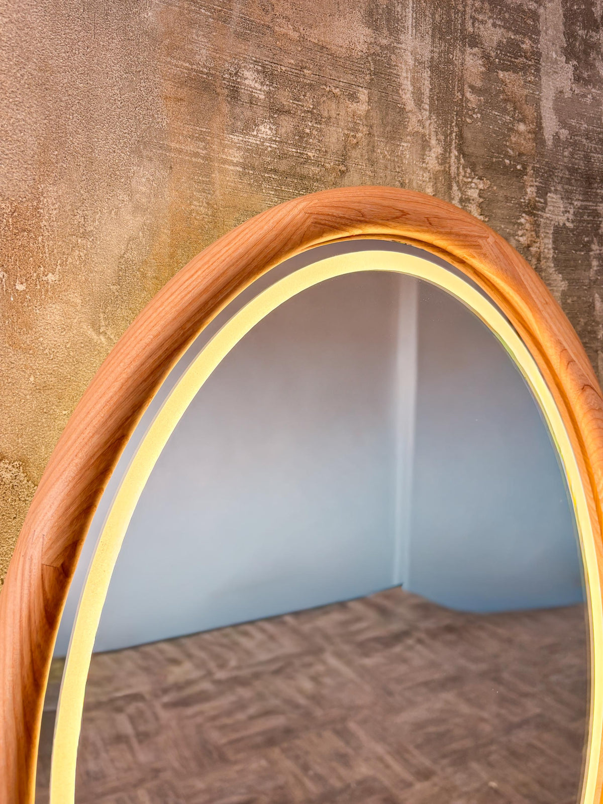 Close-up of the solid wood frame and LED light