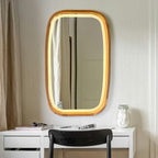 Rounded rectangle mirror with soft LED light in a bathroom