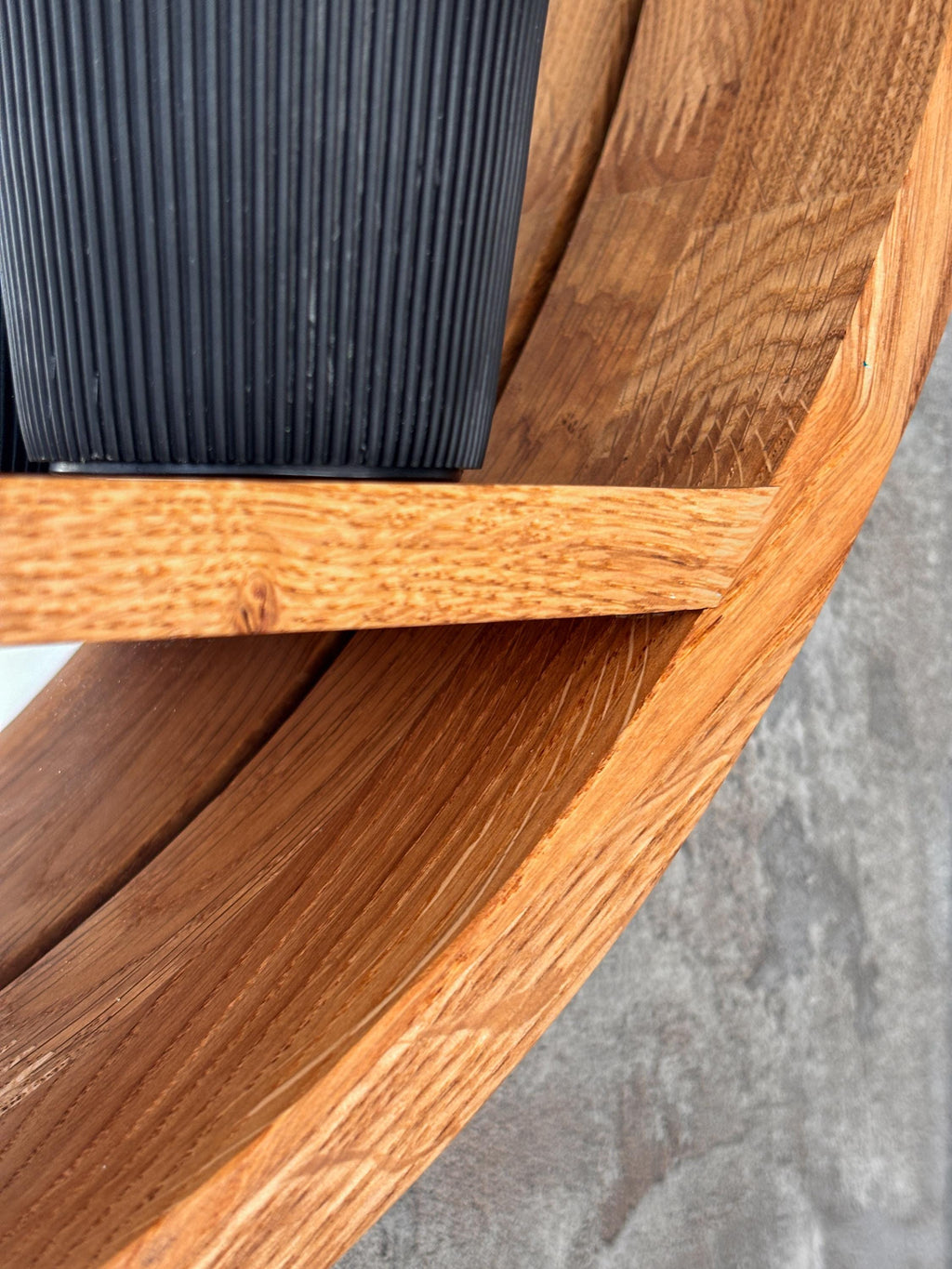 Detail of the shelf edge and mirror glass