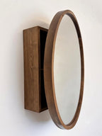 Side profile of the round mirror cabinet and its wall-mounted wood body