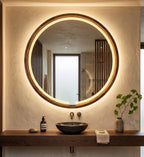Round LED wood mirror with warm light above a bathroom vanity