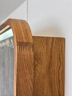 Close-up of the soft-close hinge and door edge