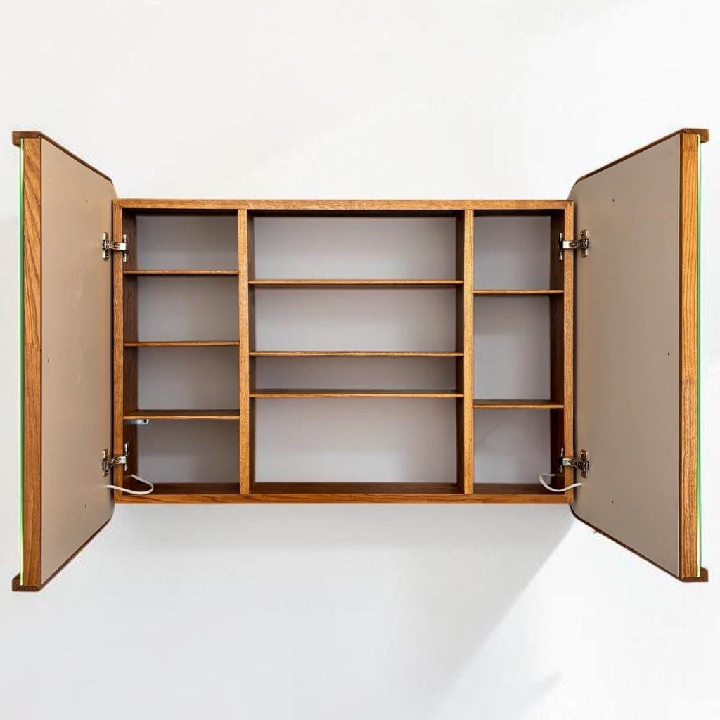 Two-door wood cabinet open, showing the adjustable interior shelves