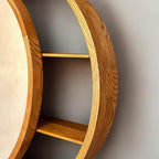 Close-up of the crescent shelves in solid wood